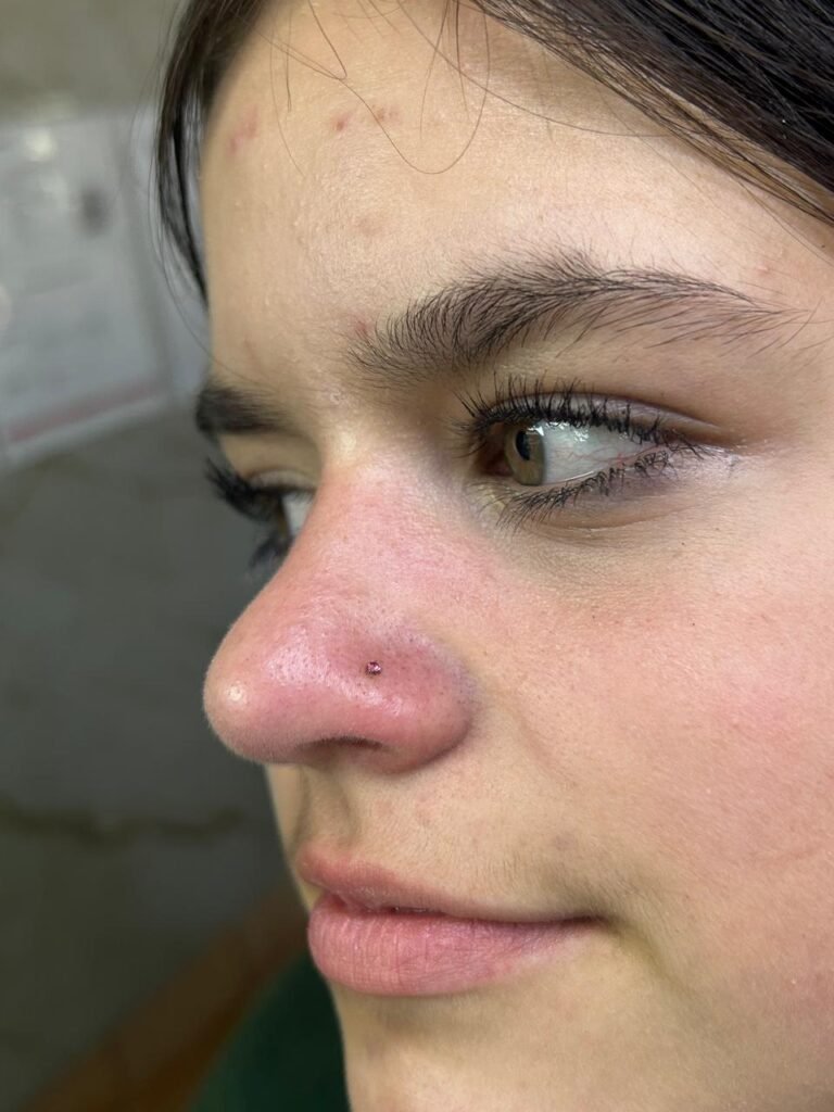 Nose piercing done at Tinta y Pinta Tattoo Quito